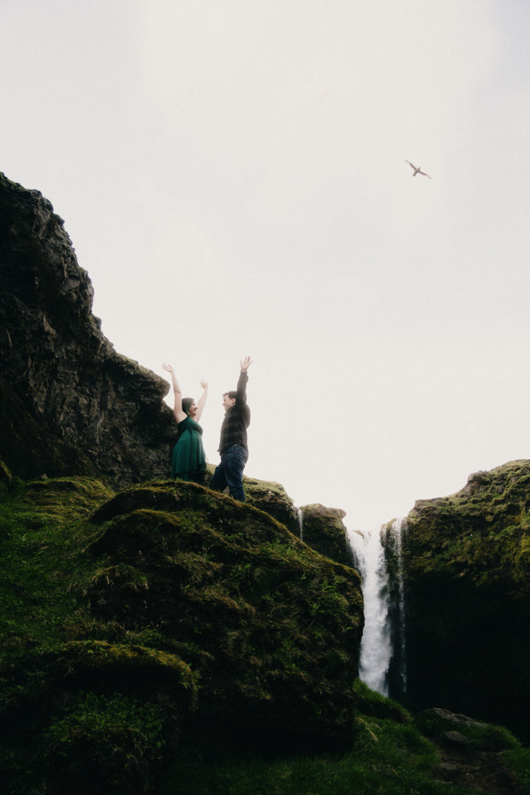 Happy engaged couple in Iceland
