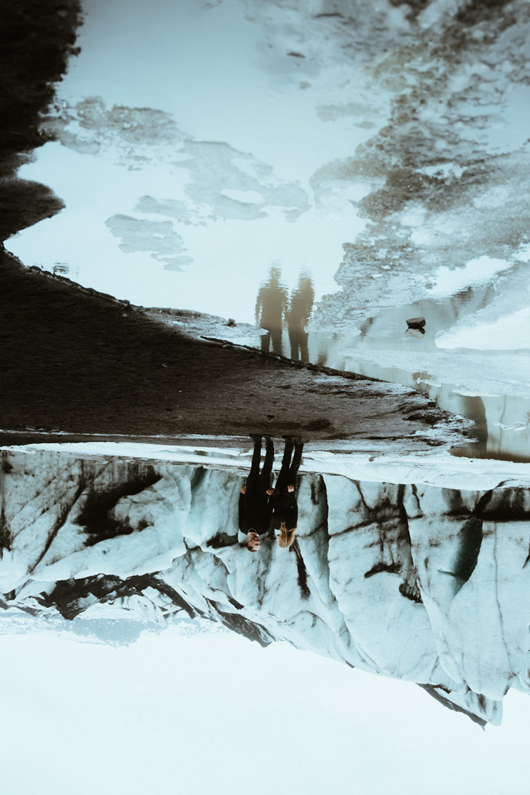 Creative photo of a couple with glacier background