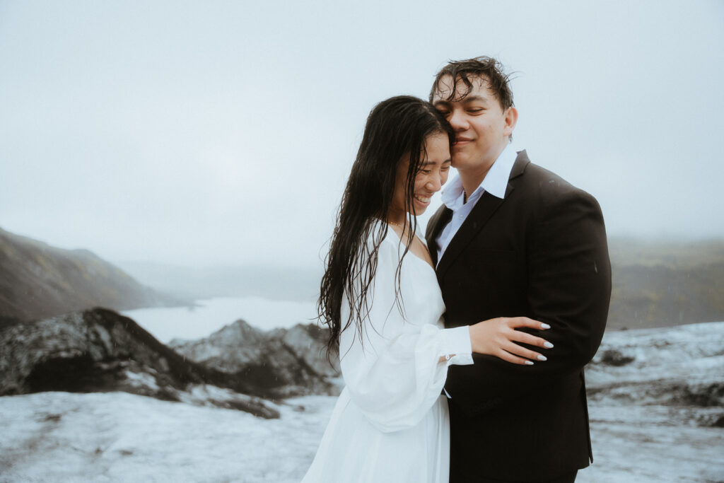 Couple hugging during their South Coast Iceland Elopement
